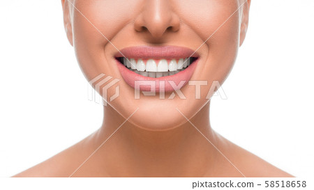 Happy smiling woman with perfect teeth. Close up view. Dental health concept. Happy smiling woman with perfect teeth. Close up view. Dental health concept. 58518658