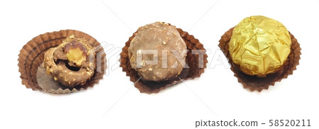 Brown Round Chocolate Candies in Paper Package Brown Round Chocolate Candies in Paper Package 58520211