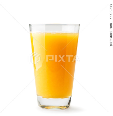 Orange juice in a glass close-up on a white 58520255