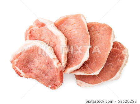 Pieces of raw meat with a layer of fat on a white Pieces of raw meat with a layer of fat on a white 58520258