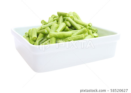 Side of Fresh chop green yard long bean in bowl on white background. Side of Fresh chop green yard long bean in bowl on white background. 58520627