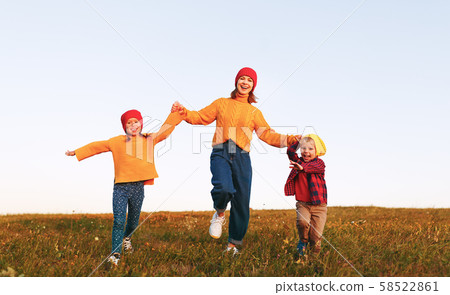 happy family mother and children in autumn nature happy family mother and children in autumn nature 58522861