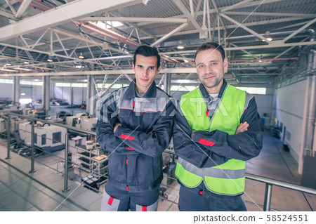 Workers in factory 58524551