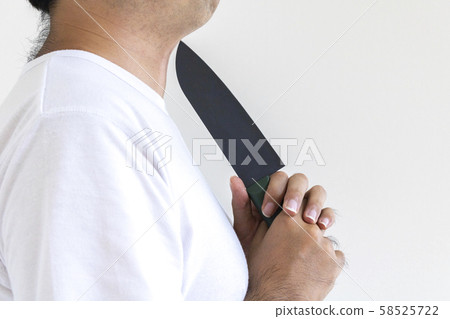 A man with a knife in his neck 58525722