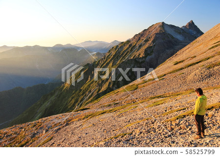 Northern Alps, Hoho High Mountain Range, Minamidake tent tent scene, Nakadake and Kasumigatake in the setting sun Northern Alps, Hoho High Mountain Range, Minamidake tent tent scene, Nakadake and Kasumigatake in the setting sun 58525799
