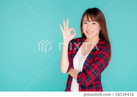 Beautiful portrait young asian woman smiling confident and excited summer holiday isolated 58526428