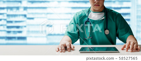 Surgeon doctor with tablet computer at hospital. Surgeon doctor with tablet computer at hospital. 58527565