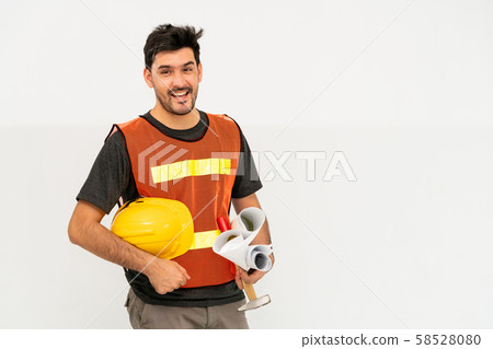 Construction worker standing on white background. 58528080