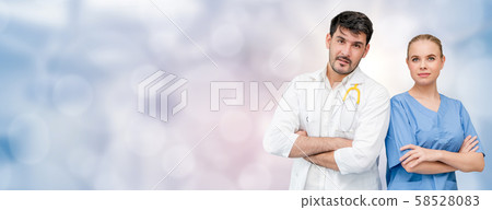 Doctors at hospital working with another doctor. 58528083