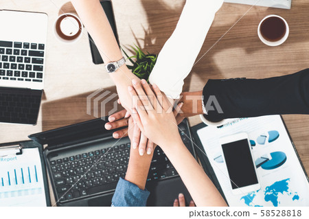 Teamwork business people join hands in meeting. Teamwork business people join hands in meeting. 58528818