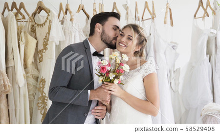 Bride and groom in wedding dress prepare ceremony. 58529408