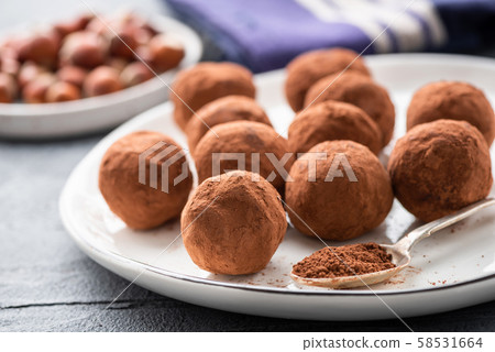 Homemade dark chocolate truffles 58531664