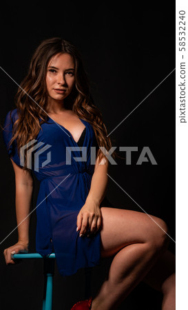 Young beautiful woman in transparent negligee Young beautiful woman in transparent negligee 58532240