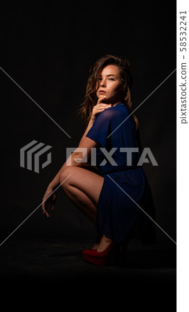 Young beautiful woman in transparent negligee Young beautiful woman in transparent negligee 58532241