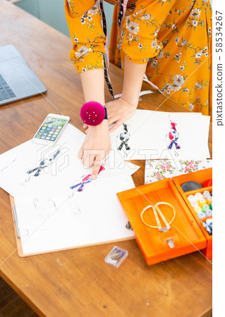 Fashion designer female 58534267