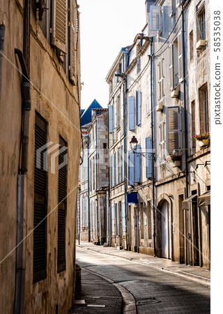 Narrow street in the historic centre of La Rochelle Narrow street in the historic centre of La Rochelle 58535038