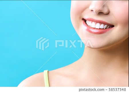 Perfect healthy teeth smile of a young woman. Teeth whitening. Dental clinic patient. Image Perfect healthy teeth smile of a young woman. Teeth whitening. Dental clinic patient. Image 58537348