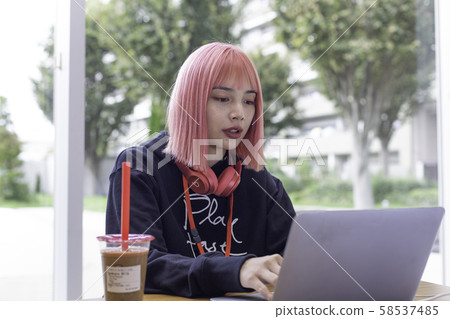 Female designer with pink hair Female designer with pink hair 58537485