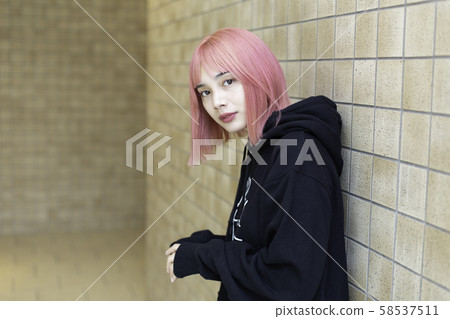 Female designer with pink hair 58537511