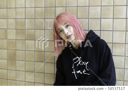 Female designer with pink hair Female designer with pink hair 58537517