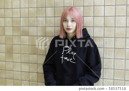 Female designer with pink hair Female designer with pink hair 58537518