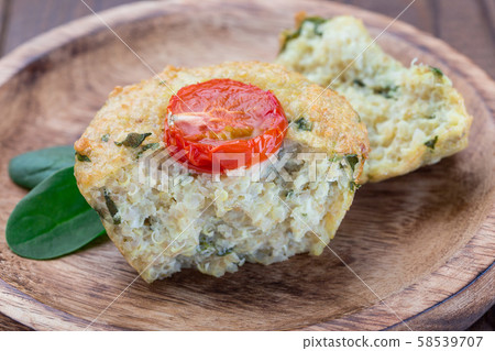 Savory muffins with quinoa, cheese and spinach 58539707