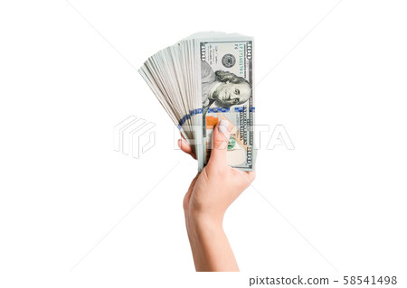 Top view of isolated female hand holding a fan of Top view of isolated female hand holding a fan of 58541498