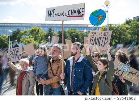 People with placards and posters on global strike for climate change. People with placards and posters on global strike for climate change. 58541608