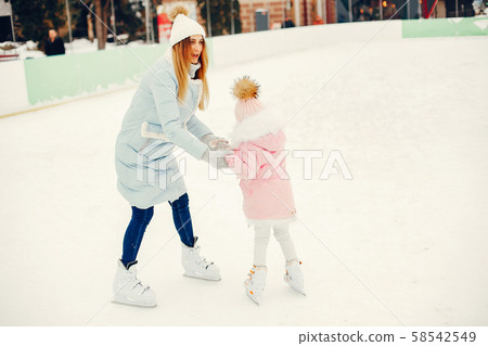 Cute and beautiful family in a winter city 58542549