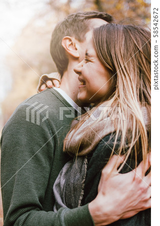 Young happy couple in love friends dressed Young happy couple in love friends dressed 58542672