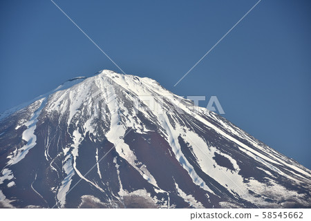Take a picture of the clear blue surface of Mt. Fuji from Narusawa Village, Yamanashi Prefecture during Golden Week in May. Take a picture of the clear blue surface of Mt. Fuji from Narusawa Village, Yamanashi Prefecture during Golden Week in May. 58545662