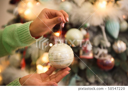 Holidays, celebration and people concept - young woman over christmas interior background. Holidays, celebration and people concept - young woman over christmas interior background. 58547220