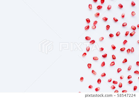 Pomegranate seeds on white background. Pomegranate seeds on white background. 58547224