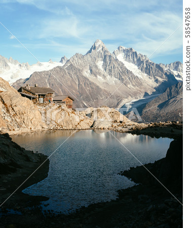 Wooden cabin on Lac Blanc lake 58547658