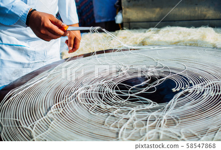 The making of Turkish desert Kadayif pastry 58547868