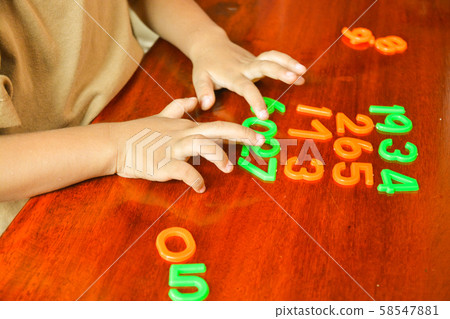 Hand of Asian Child or Kids Learning Number 58547881