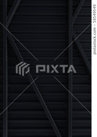 Shiny black striped metallic wall of a building Shiny black striped metallic wall of a building 58549549