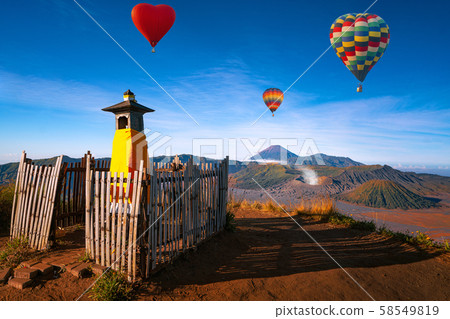 Hot air Balloon and Landscape of Bromo volcano Hot air Balloon and Landscape of Bromo volcano 58549819