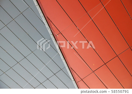 Division of two textures: red metal rightangled tiles and white metal rightangled tiles 58550791