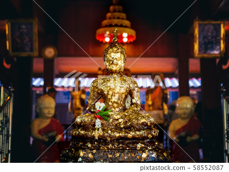 Face of golden Buddha, golden image of Buddha 58552087