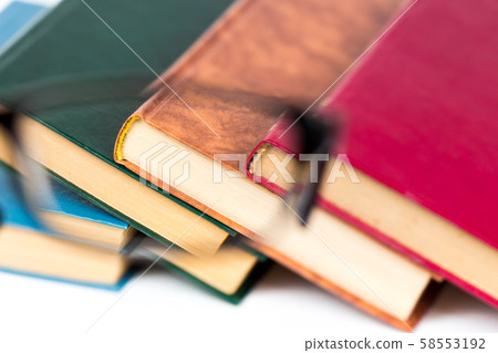 look at books through glasses as a background look at books through glasses as a background 58553192