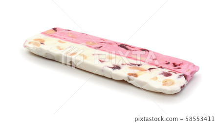 Sweet fruits nougat with nuts  isolated 58553411