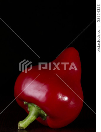 Red sweet pepper on a black background 58554338