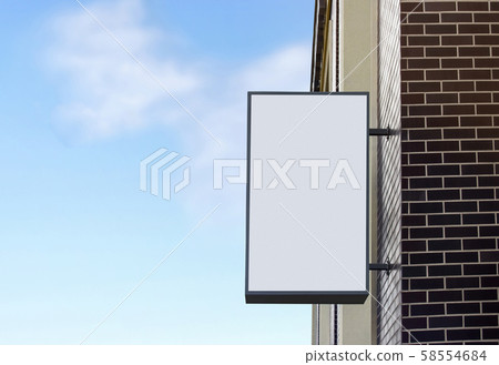 Blank white outdoor box mockup on brick wall, sky background Blank white outdoor box mockup on brick wall, sky background 58554684