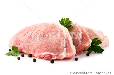 Raw meat with parsley leaves and peppers close-up Raw meat with parsley leaves and peppers close-up 58554733