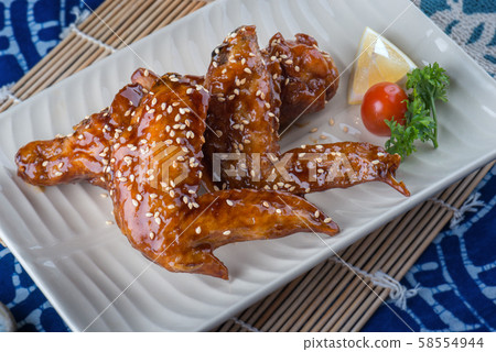 Japanese style chicken wing with sweet sauce. Japanese style chicken wing with sweet sauce. 58554944