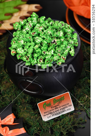 Cauldron corn. Halloween treat Cauldron corn. Halloween treat 58556294