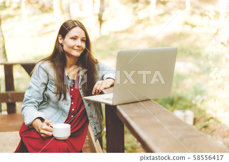 Young caucasian smart brunette businesswoman Young caucasian smart brunette businesswoman 58556417