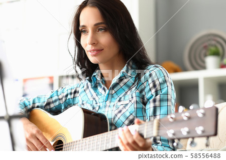 Pretty girl creating new composition 58556488
