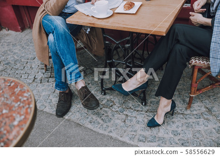 Date at the cafe terrace at daytime stock photo 58556629